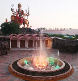 Evening View Of Mata Murti with Colorful Light Fountain at Vaishno Devi Dham Vrindavan by J C Chaudhry Numerologist
