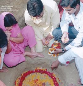 (From Left To right) Managing Trustee (Sh j.C.Chaudhry)with his wife Smt.Kamla Chaudhry and their Children Aakash & Aashish Chaudhry performing Bhumi Pujan at Vaishno Devi Dham Vrindavan by J C Chaudhry Numerologist