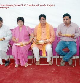 From Right to left Architect, Managing Trustee (Sh.J.C.Chaudhry) with his wife,pujari ji having prasad After Bhumi Pujan at Vaishno Devi Dham Vrindavan by J C Chaudhry Numerologist