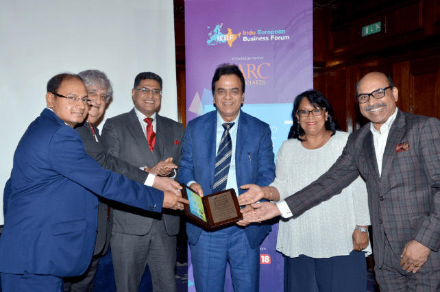 Mr. J C Chaudhry while receiving an award on Role of Numerology Indo-European Investors Meet - 2018 London