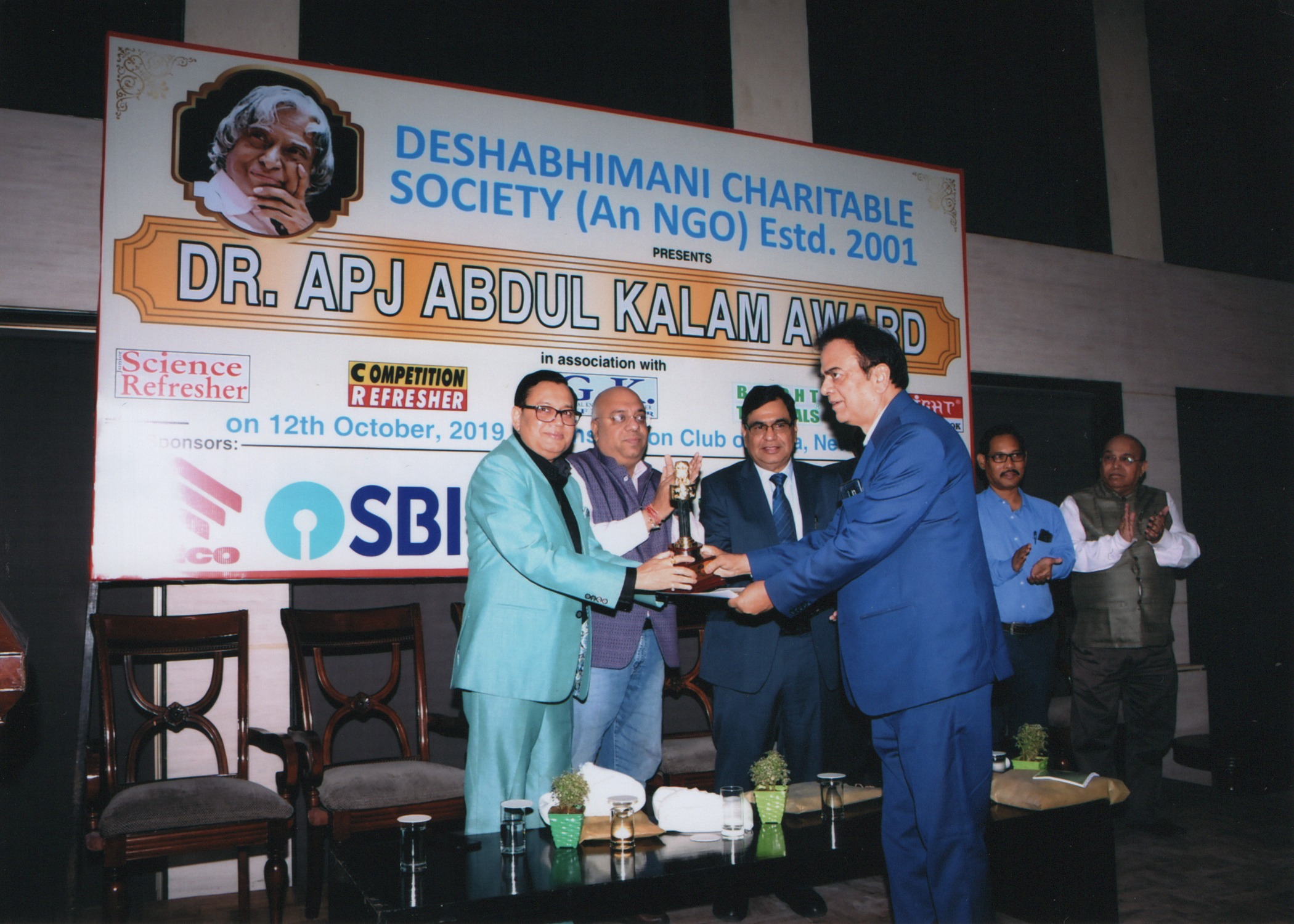 J C Chaudhry while taking the Dr. APJ Abdul Kalam Award for Excellence